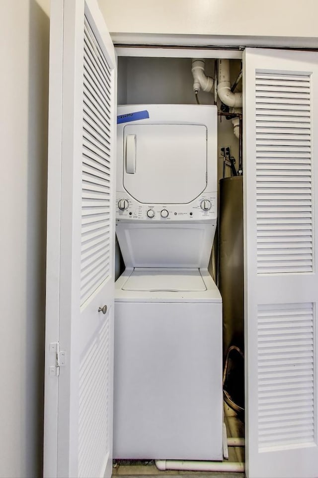4950 N Western Ave Unit 101, Chicago, IL 60625 - washroom with estacked washer and dryer
