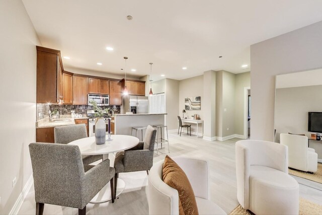 4950 N Western Ave Unit 101, Chicago, IL 60625 - dining space with recessed lighting and baseboards