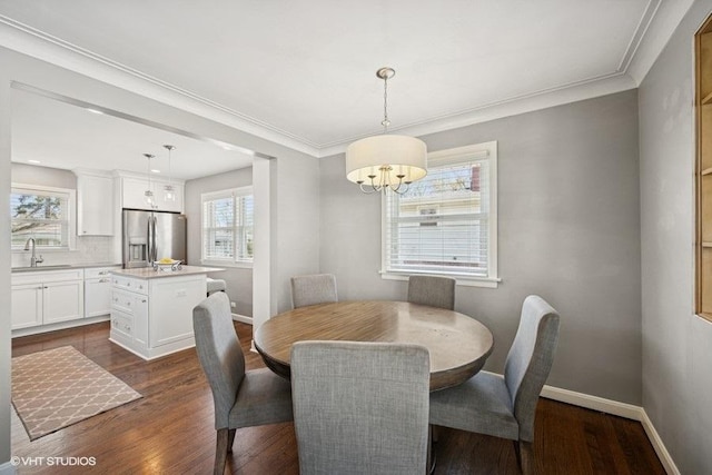 907 N Wilshire Ln, Arlington Heights, IL 60004 - dining space with a chandelier, dark wood finished floors, baseboards, and crown molding