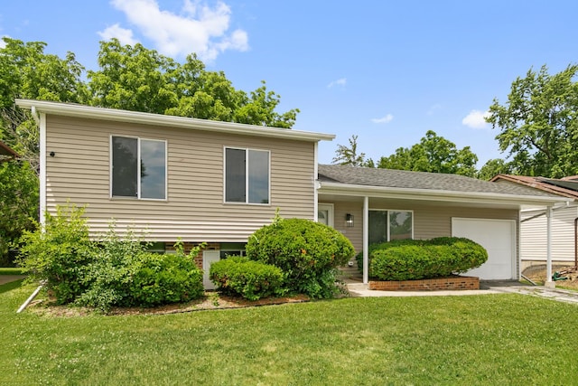 18200 Fountainbleau Dr, Hazel Crest, IL 60429 - split level home featuring an attached garage and a front yard