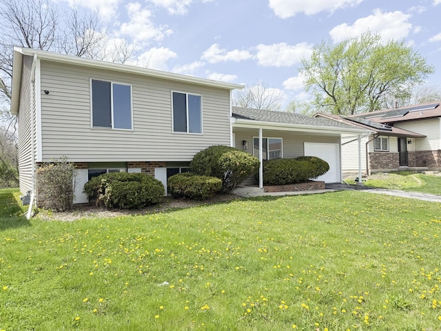 18200 Fountainbleau Dr, Hazel Crest, IL 60429 - split level home with a garage, a front lawn, and driveway