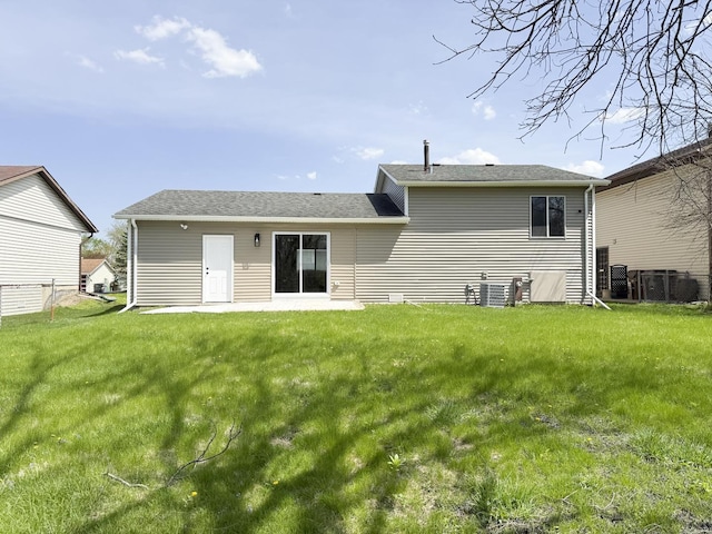 18200 Fountainbleau Dr, Hazel Crest, IL 60429 - rear view of property with a yard and central air condition unit