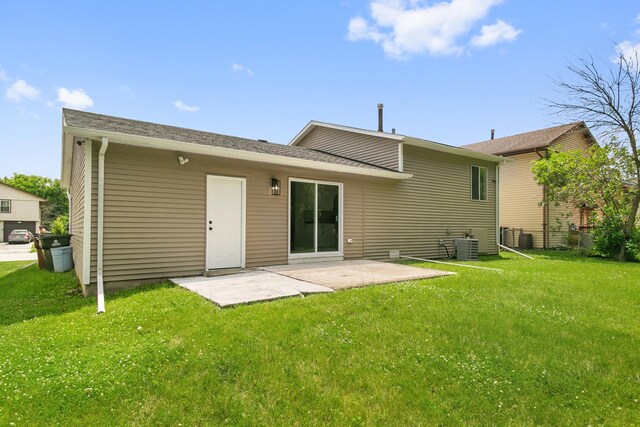 18200 Fountainbleau Dr, Hazel Crest, IL 60429 - rear view of house featuring a patio and a lawn