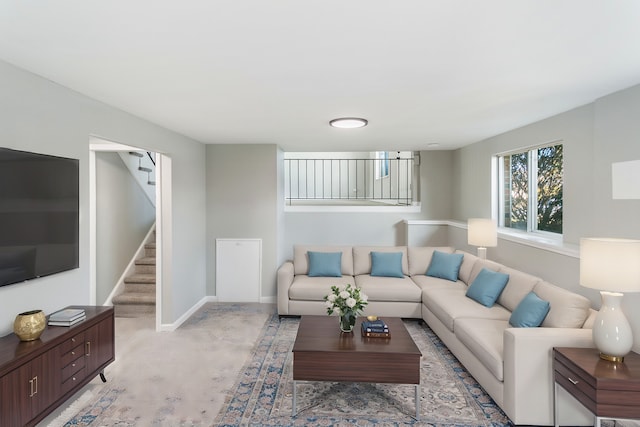 18200 Fountainbleau Dr, Hazel Crest, IL 60429 - living room with stairway, baseboards, and light colored carpet