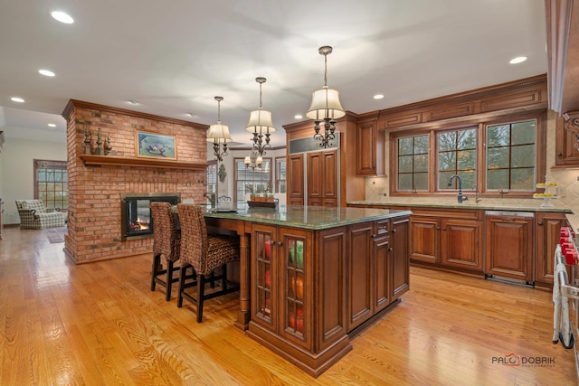 36955 N Fox Hill Dr, Wadsworth, IL 60083 - kitchen with recessed lighting, dark stone counters, tasteful backsplash, and glass insert cabinets