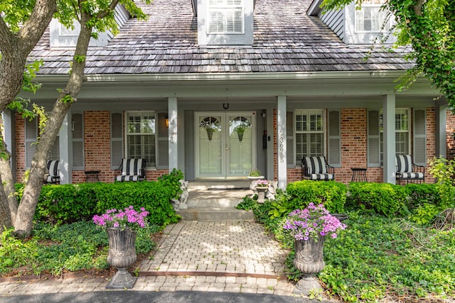 36955 N Fox Hill Dr, Wadsworth, IL 60083 - doorway to property with brick siding and a porch