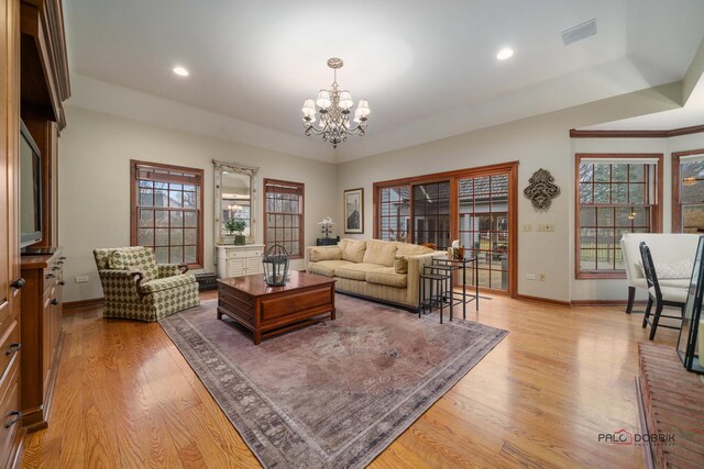 36955 N Fox Hill Dr, Wadsworth, IL 60083 - living area with a chandelier, healthy amount of natural light, light wood-style floors, and recessed lighting