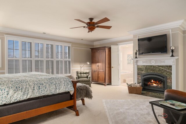 36955 N Fox Hill Dr, Wadsworth, IL 60083 - bedroom with light colored carpet, crown molding, a high end fireplace, ensuite bathroom, and a ceiling fan