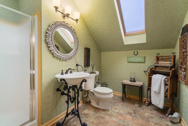 36955 N Fox Hill Dr, Wadsworth, IL 60083 - full bath featuring a skylight, a stall shower, lofted ceiling, and stone finish flooring