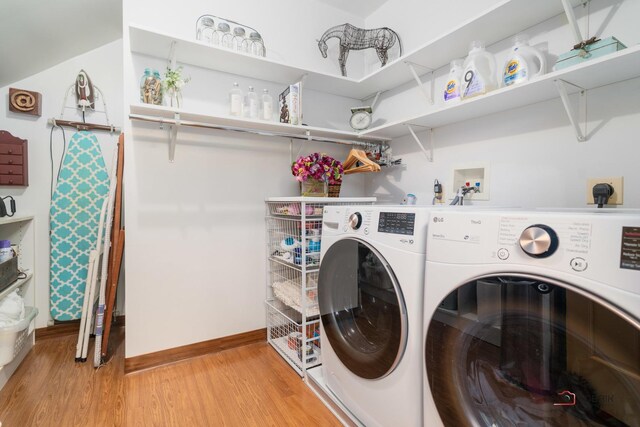 36955 N Fox Hill Dr, Wadsworth, IL 60083 - laundry room with independent washer and dryer and light wood-style flooring