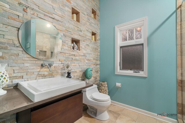 36955 N Fox Hill Dr, Wadsworth, IL 60083 - bathroom with baseboards and vanity
