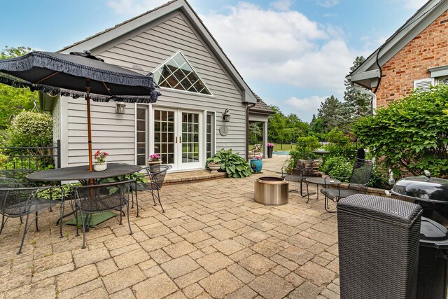 36955 N Fox Hill Dr, Wadsworth, IL 60083 - view of patio with french doors, grilling area, and outdoor dining area