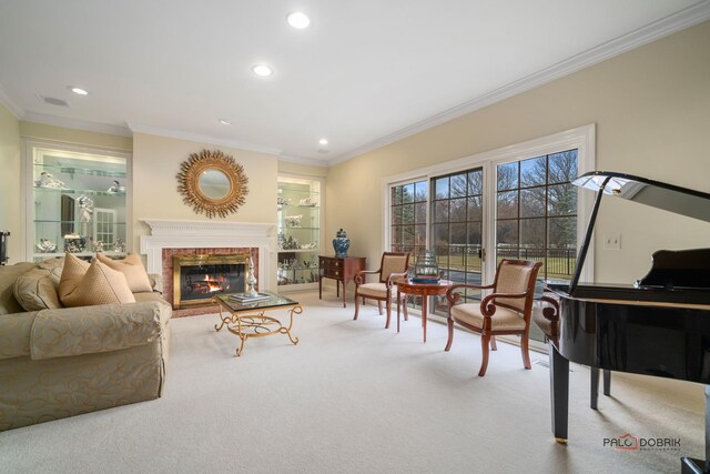 36955 N Fox Hill Dr, Wadsworth, IL 60083 - carpeted living room with a fireplace, ornamental molding, and recessed lighting