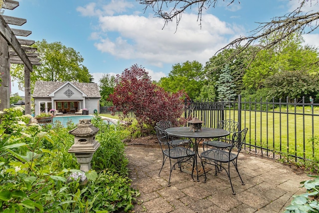 36955 N Fox Hill Dr, Wadsworth, IL 60083 - view of patio featuring an exterior structure, an outdoor structure, and outdoor dining area