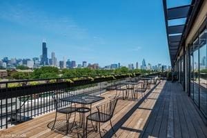 1033 W 14th Pl Unit 337, Chicago, IL 60608 - wooden terrace featuring a view of skyline