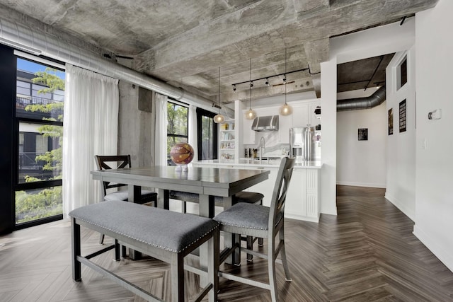 1033 W 14th Pl Unit 337, Chicago, IL 60608 - dining space with baseboards
