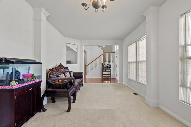 3210 Drury Ln, Carpentersville, IL 60110 - sitting room featuring carpet floors, healthy amount of natural light, and stairs