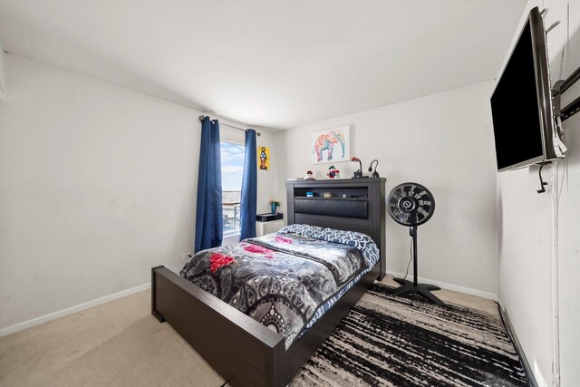 3210 Drury Ln, Carpentersville, IL 60110 - carpeted bedroom featuring baseboards