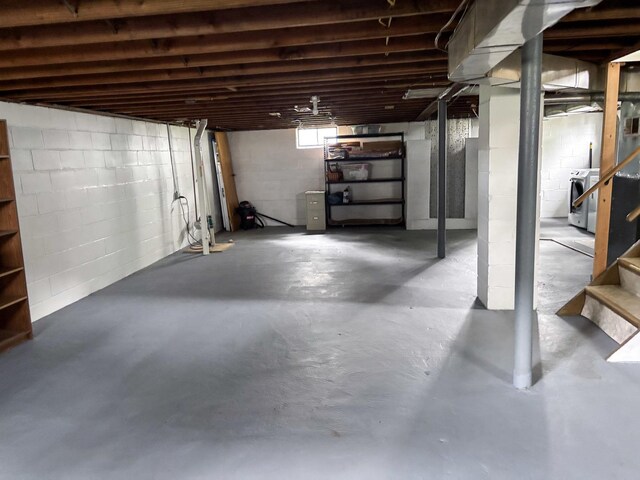 1711 17th Ave, Sterling, IL 61081 - below grade area featuring washer / dryer and stairs