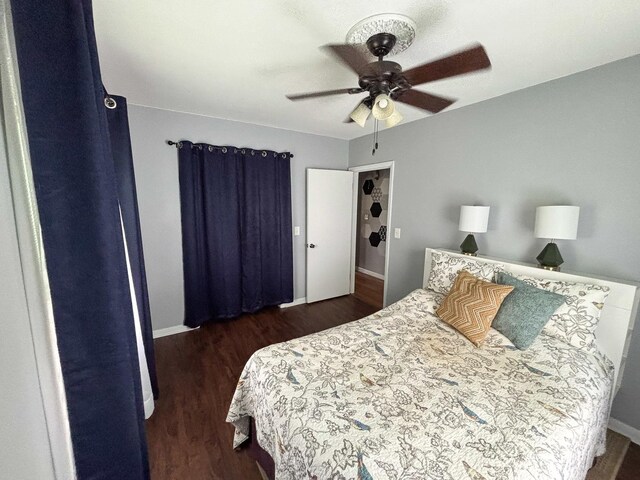 1711 17th Ave, Sterling, IL 61081 - bedroom featuring wood finished floors, baseboards, and ceiling fan