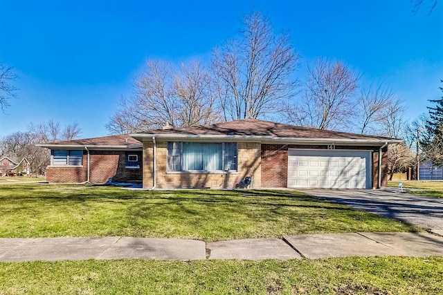 141 W 13th St, Chicago Heights, IL 60411 - single story home featuring a garage, asphalt driveway, and brick siding