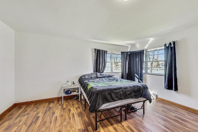 141 W 13th St, Chicago Heights, IL 60411 - bedroom featuring wood finished floors and baseboards