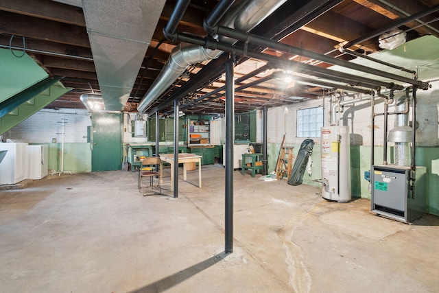 3006 N Sayre Ave, Chicago, IL 60634 - below grade area featuring gas water heater, stairway, and washing machine and dryer