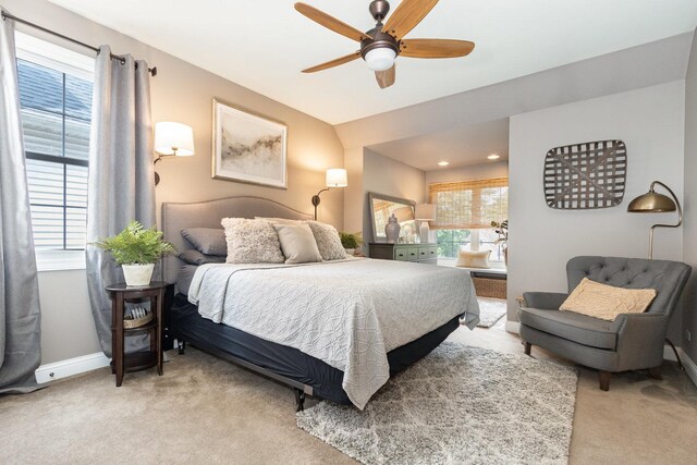 140 N Oak St, Elmhurst, IL 60126 - bedroom with light carpet, multiple windows, baseboards, and a ceiling fan