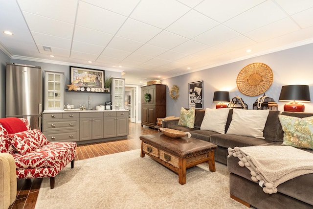 140 N Oak St, Elmhurst, IL 60126 - living room featuring light wood-style floors, crown molding, and recessed lighting