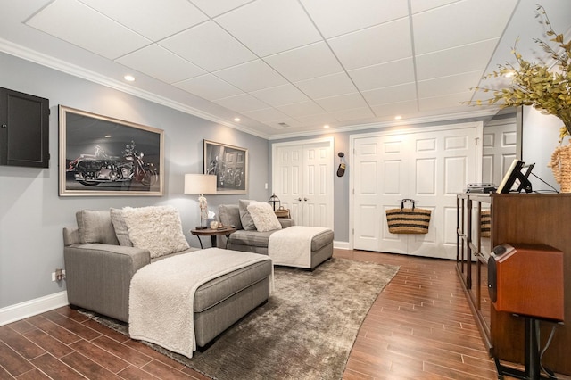 140 N Oak St, Elmhurst, IL 60126 - living room featuring ornamental molding, dark wood-style flooring, baseboards, and recessed lighting