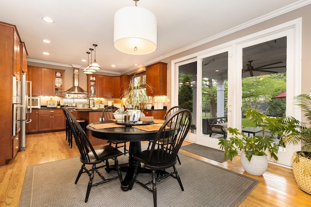 140 N Oak St, Elmhurst, IL 60126 - dining space featuring light wood-style flooring, ornamental molding, recessed lighting, and ceiling fan