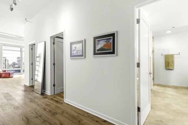 333 N Canal St Unit 2804, Chicago, IL 60606 - hallway featuring baseboards and wood finished floors