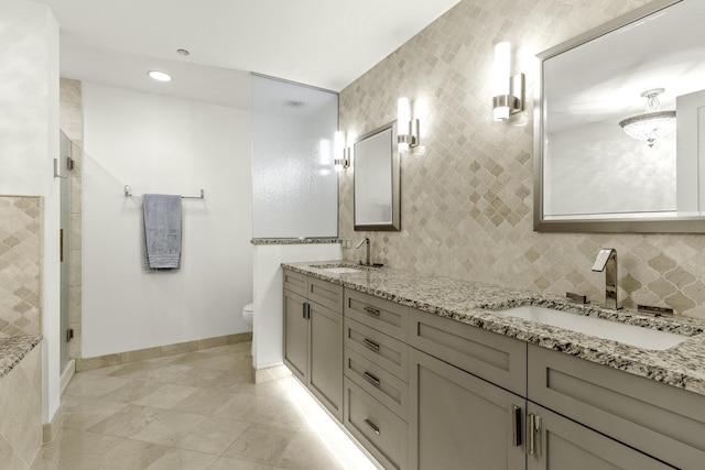 333 N Canal St Unit 2804, Chicago, IL 60606 - full bath featuring double vanity, toilet, a stall shower, tile patterned flooring, and baseboards