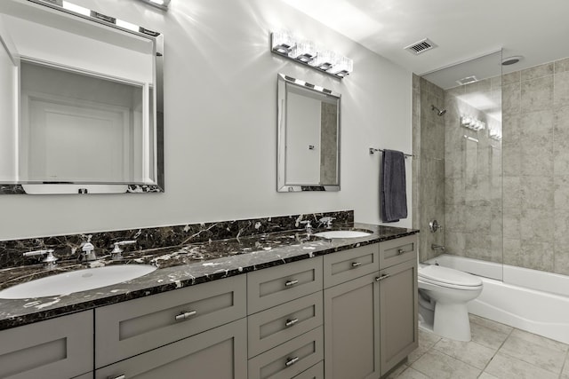 333 N Canal St Unit 2804, Chicago, IL 60606 - full bathroom with double vanity, toilet, shower / washtub combination, and tile patterned floors