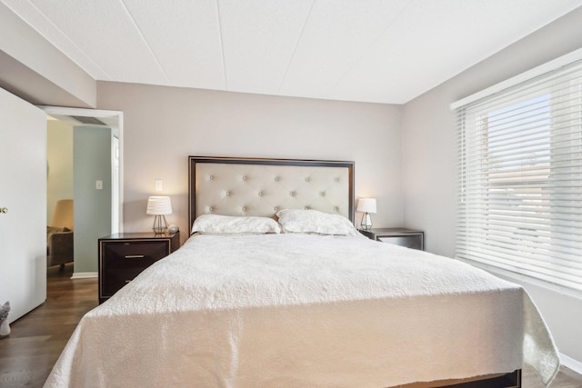 68 Pier Dr Unit 102, Westmont, IL 60559 - bedroom featuring wood finished floors and baseboards