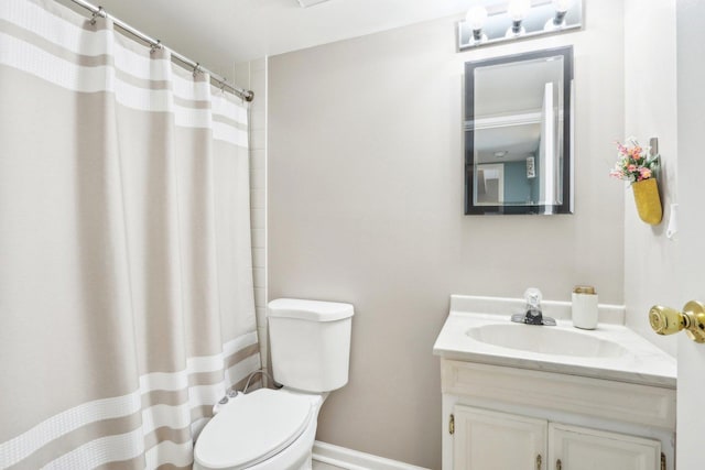68 Pier Dr Unit 102, Westmont, IL 60559 - bathroom with vanity, toilet, a shower with curtain, and baseboards