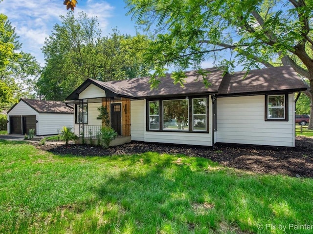490 S Mchenry Ave, Crystal Lake, IL 60014 - single story home with a garage, a front lawn, an outdoor structure, and a porch