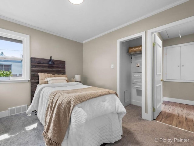 490 S Mchenry Ave, Crystal Lake, IL 60014 - bedroom with attic access, carpet, crown molding, a closet, and baseboards