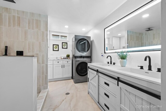 490 S Mchenry Ave, Crystal Lake, IL 60014 - full bathroom featuring stacked washer / dryer, double vanity, walk in shower, recessed lighting, and tile walls