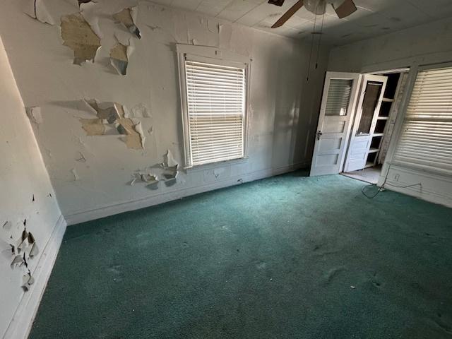 7952 S Elizabeth St, Chicago, IL 60620 - unfurnished bedroom with carpet floors, baseboards, and a ceiling fan