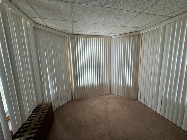 7952 S Elizabeth St, Chicago, IL 60620 - carpeted empty room featuring radiator