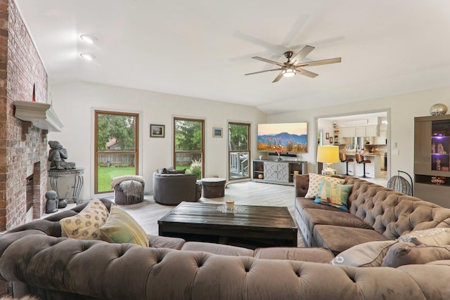 304 Fairhaven Dr, Winthrop Harbor, IL 60096 - living room featuring lofted ceiling, a ceiling fan, and wood finished floors