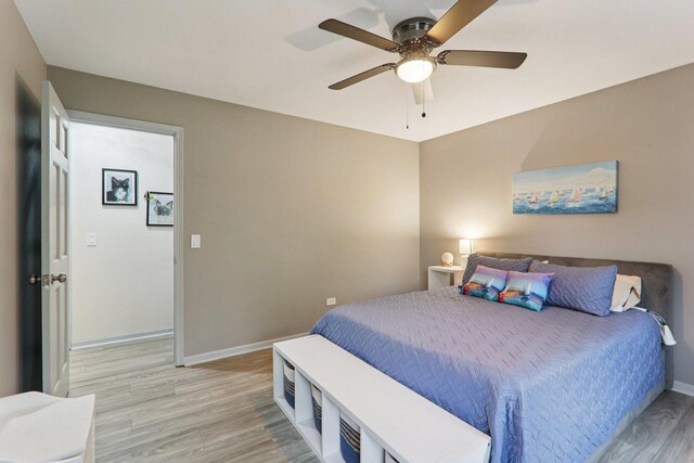 304 Fairhaven Dr, Winthrop Harbor, IL 60096 - bedroom with light wood-type flooring and ceiling fan