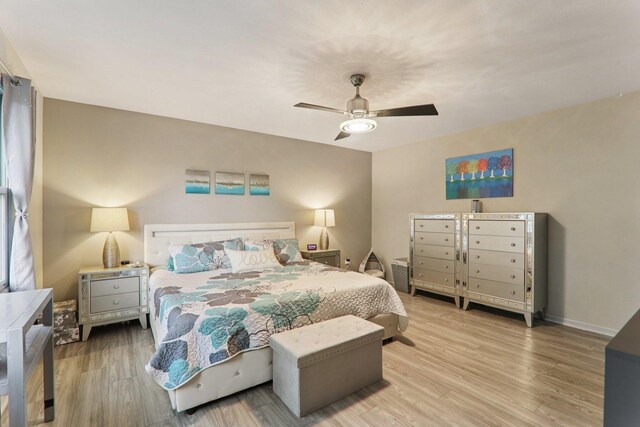 304 Fairhaven Dr, Winthrop Harbor, IL 60096 - bedroom featuring wood finished floors and a ceiling fan