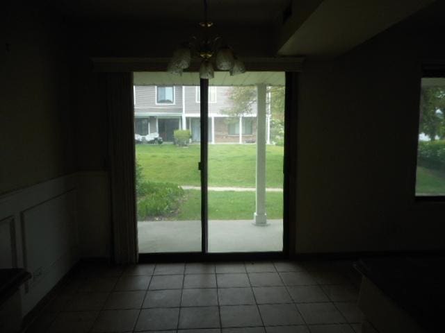 464 Buchanan Ct, Vernon Hills, IL 60061 - unfurnished dining area with healthy amount of natural light, tile patterned flooring, and ceiling fan