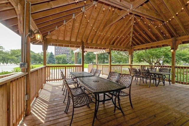 5555 N Sheridan Rd Unit 901A, Chicago, IL 60640 - wooden terrace featuring outdoor dining area and a gazebo