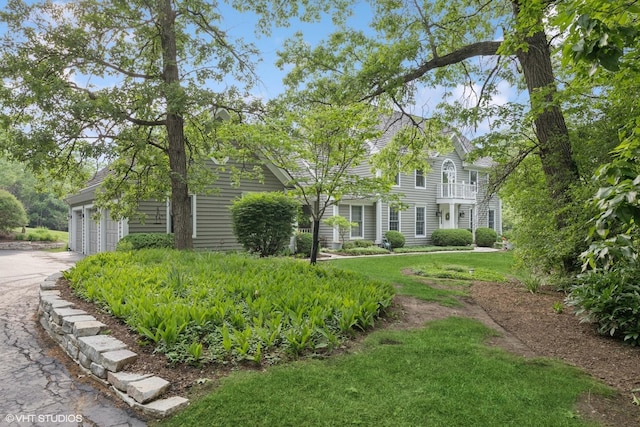 21712 N Old Farm Rd, Deer Park, IL 60010 - view of front of house featuring a front lawn, driveway, a balcony, and a garage