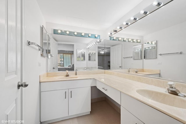 4747 Howard St Unit 205, Skokie, IL 60076 - full bathroom with double vanity and tile patterned floors