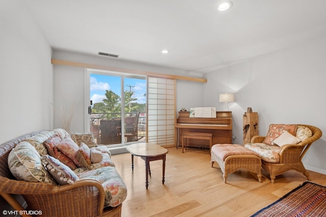 4747 Howard St Unit 205, Skokie, IL 60076 - sitting room featuring wood finished floors and recessed lighting