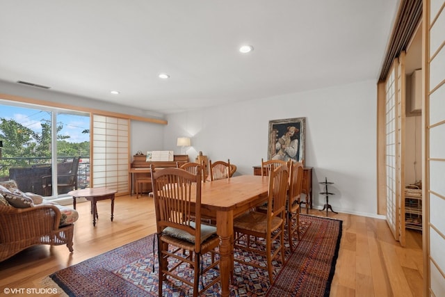 4747 Howard St Unit 205, Skokie, IL 60076 - dining room with light wood-style floors and recessed lighting